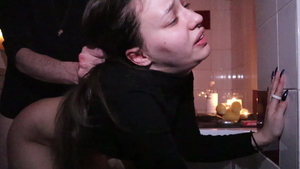 Spanking in company with naughty brunette